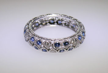 18kt Art Deco engagement ring with sapphires and white diamonds